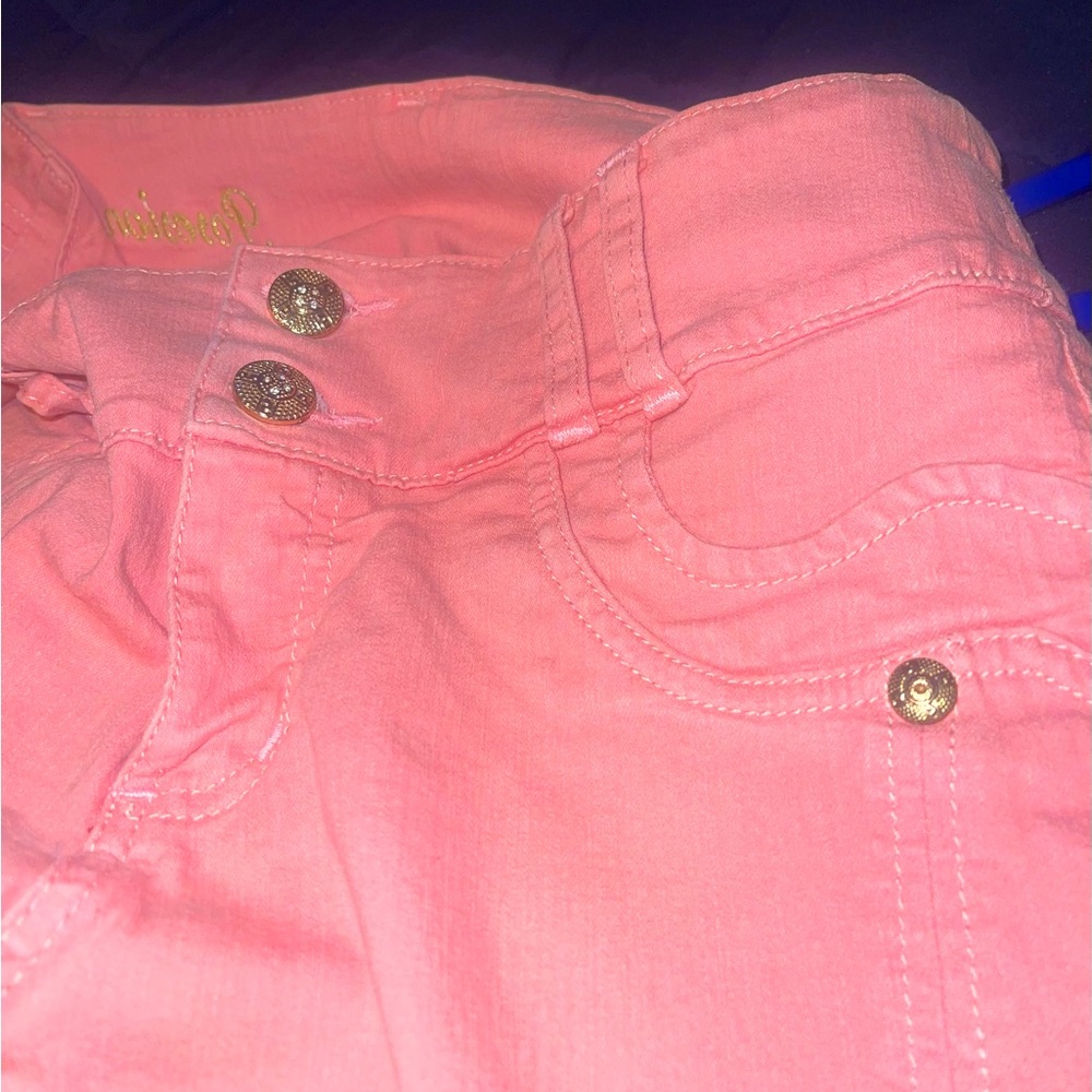 Peachy pink Colombian Capri jeans. Very fitting, enhances curves.